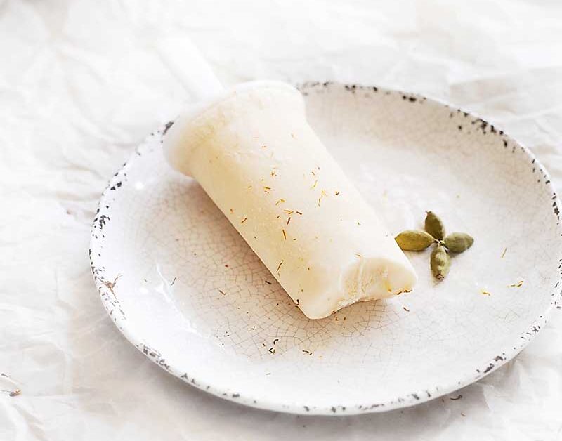 These frozen yogurt kulfi pops are a delicious, gluten free treat! With incredible Indian spices, you'll love these tasty frozen treats! gluten free popsicle