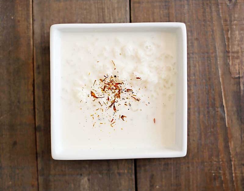 Rice Kheer is a rice pudding made with milk, cardamom, and saffron.  It's so simple, yet incredibly tasty.  You can serve it warm or cold too so its pretty versatile. Indian recipe, Indian dessert recipe, rice kheer