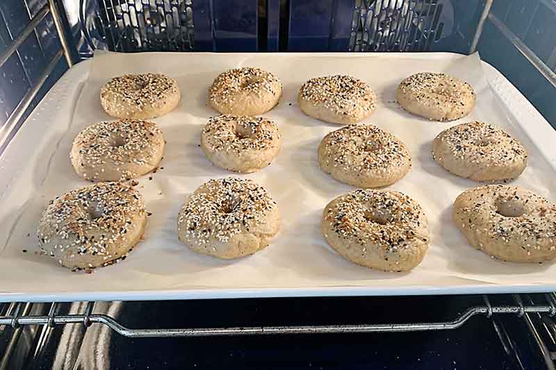 Enjoy these easy & delicious gluten free rice free bagels with your Sunday morning latte! The best part is you absolutely can not tell they are gluten free. I promise! They are free from xanthan gum, guar gum & commercial yeast! These tasty bagels are traditional Canadian Montreal style, slightly sweeter (they are boiled in water sweetened with Canadian maple syrup or honey) and a little smaller than New York style bagels. They are slightly crispy on the outside and chewy on the inside. These gluten free bakes are incredibly tasty with the perfect chewiness you've come to expect from a high quality bagel! If you're gluten free, dairy free, or vegan and miss eating bagels, you're going to love this recipe! Sourdough bagel recipe, gluten free sourdough bagels, gluten free vegan sourdough bagels, gluten free vegan, gluten free bagel recipe, gluten free bagels, teff grain, teff flour, ancient grain bagels,