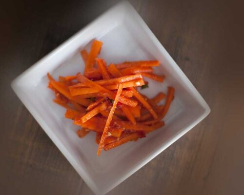 Gajar Jo Athano is a spicy pickled carrot side dish.  It goes really well with almost any curry and is actually quite healthy if you follow this recipe! Carrot, Indian side dish, Indian condiments, Spicy Food