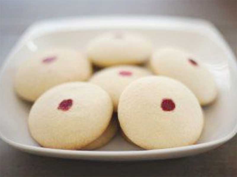 Nankhatai is pretty much the Indian version of shortbread.  Buttery and crumbly and delicious.  If you are looking for the perfect dessert to pair with coffee or chai, this is it.  Unlike shortbread cookies, Nankhatiai's are somewhat healthier for you. Indian dessert, traditional Indian Shortbread