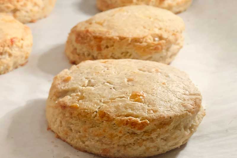 Gluten free cheddar biscuits are the perfect addition to any warm & cozy soup or stew this winter! Easily customizable for all dietary needs! DIY gifts, hostess gift ideas, host gift idea, mason jar gifts, Christmas gifts, gluten free biscuits, gluten free breads, gluten free baking