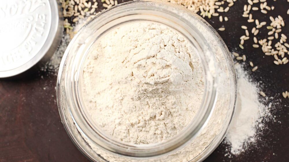 Easily make your own Gluten Free Flours! Soft & fluffy DIY brown rice flour in 3 simple steps to use in all of your gluten free baking! gluten free flours, brown rice flour, how to make your own flour, grind your own flour, blender flours