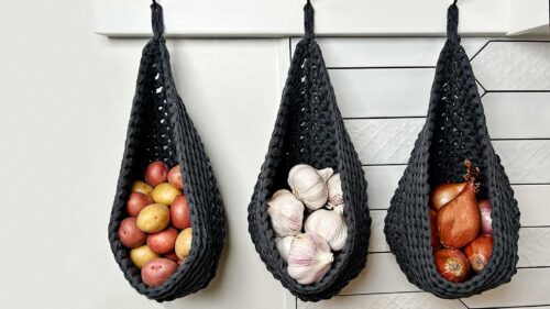 Make a gorgeous crochet hanging basket for simple and beautiful pantry organization. This pantry idea is both stunning and functional! #pantryidea, pantry organization, pantry idea, crochet patterns, free crochet pattern, crochet hanging basket, pantry idea, pantry design