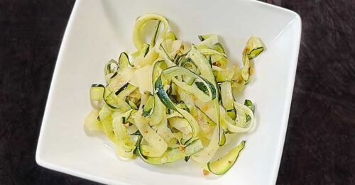 Zucchini Noodles are a delicious & healthy way to use up your garden zucchini! Learn how to make zucchini noodles (zoodles) at home with our easy step-by-step guide. Discover the best methods for creating zucchini noodles without a spiralizer, cooking, and seasoning zucchini to create a satisfying low-carb alternative to pasta dishes. #Zucchini noodles, Zoodles, Spiralizer, Gluten-free pasta, Low-carb recipes, Healthy eating, Veggie noodles, Cooking with zucchini, Zucchini recipes, Spiralized vegetables, Zucchini pasta, Homemade zoodles, Spiralizing tutorial, Quick and easy meals, Low-calorie pasta alternative, Zucchini noodle dishes, Cooking techniques, Kitchen gadgets, Healthy meal ideas, Nutrient-rich meals