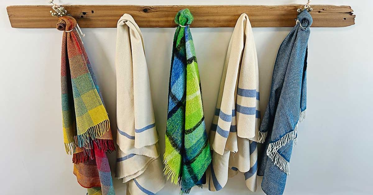 DIY tutorial on creating magnetic hanging blankets—the perfect solution for adding warmth, coziness, and style to any room! Whether you want extra insulation for winter, a soundproofing solution, a way to display your gorgeous blankets, or a unique decorative piece, this project has you covered. #diy #diyhomedecor #hangingblankets #magnets