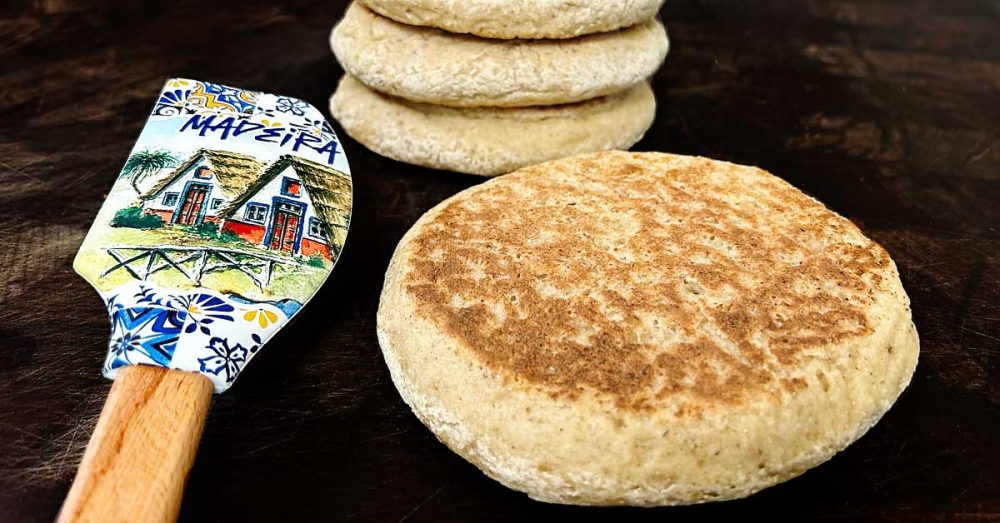 Discover the secrets to making Bolo do Caco, Madeira's iconic flatbread, with this ultimate guide! Whether you're craving the traditional version with its pillowy texture and subtle sweet potato flavor or seeking a gluten-free vegan alternative that's just as delicious, we've got you covered.