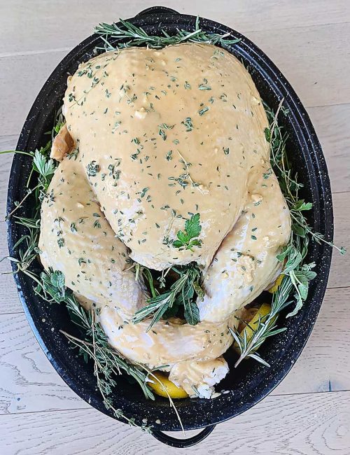 With these simple ingredients you can make the most moist & delicious turkey you'll ever taste! Bonus, the gravy is out of this world! Try this simple turkey marinade to make the most incredible gravy you'll ever taste! turkey recipe, turkey marinade, easter dinner, thanksgiving dinner, Christmas dinner, roast turkey marinade, best gravy, gravy recipe, gluten free international holiday recipes
